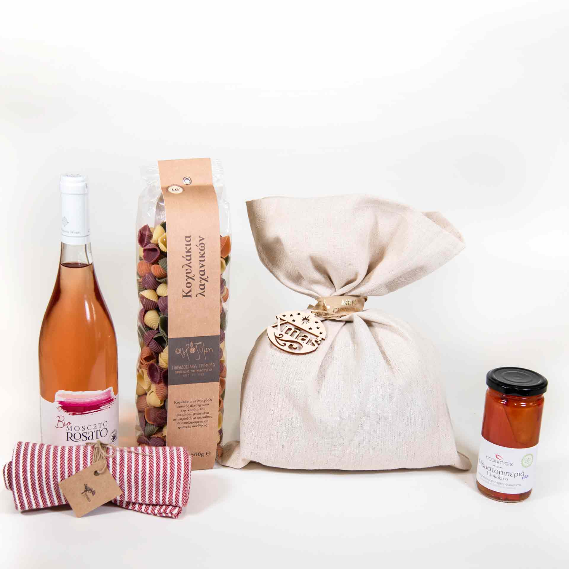 wine, pasta, linen punch and peppers in a jar