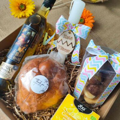 Easter gift package with wine, tsoureki, biscuits