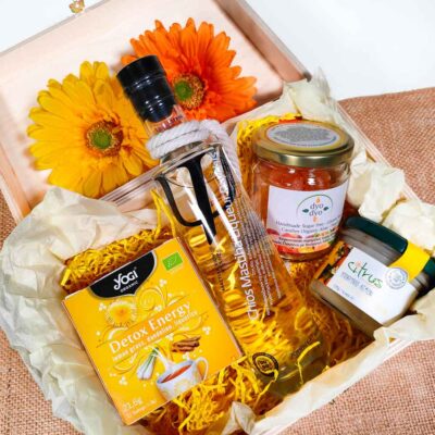 Yellow package composition with tea, chewing gum, submarine and candies