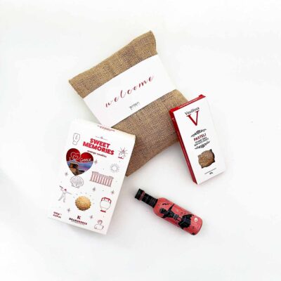 Welcome gift box for hotel guests with snacks and drinks