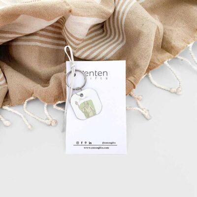 metal keychain with Neptune design