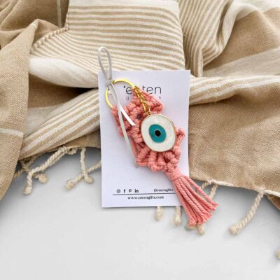 Salmon macrame key ring with metallic eye design