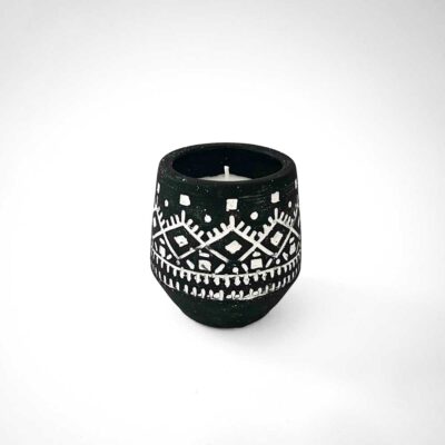 candle in concrete container