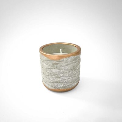 candle in concrete container
