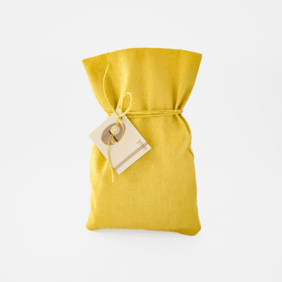 a yellow bag with a tag