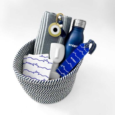 Basket with bookmark, towel and thermos